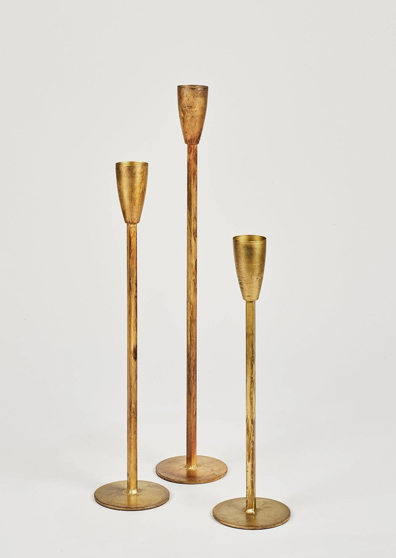 Set Of 3 Antique Gold Taper Candle Holders - 15.75-23.75" 1 Set Of 3 Antique Gold Taper Candle Holders - 15.75-23.75"